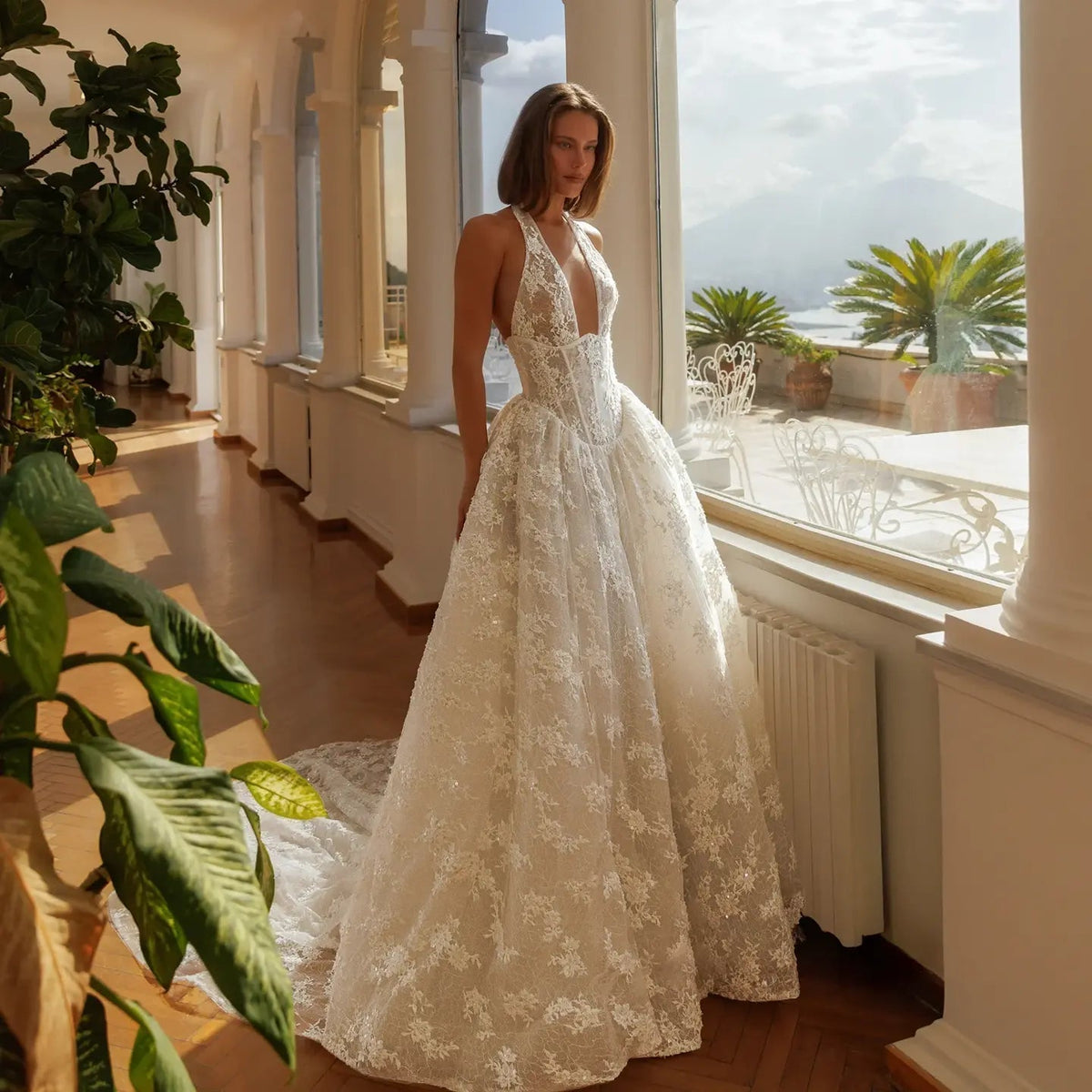 Modern Ivory Lace Deep V-Neck Halter Ball Gown Wedding Dress with Train ZP119 - VelvetHem