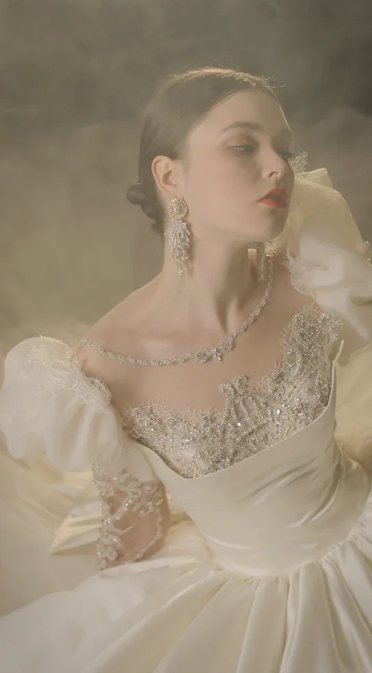 Regal Ball Gown Illusion Neckline Tulle Puff Sleeve Beaded Lace Wedding Dress with Oversized Bow Train E-304 by ZAPDRESS