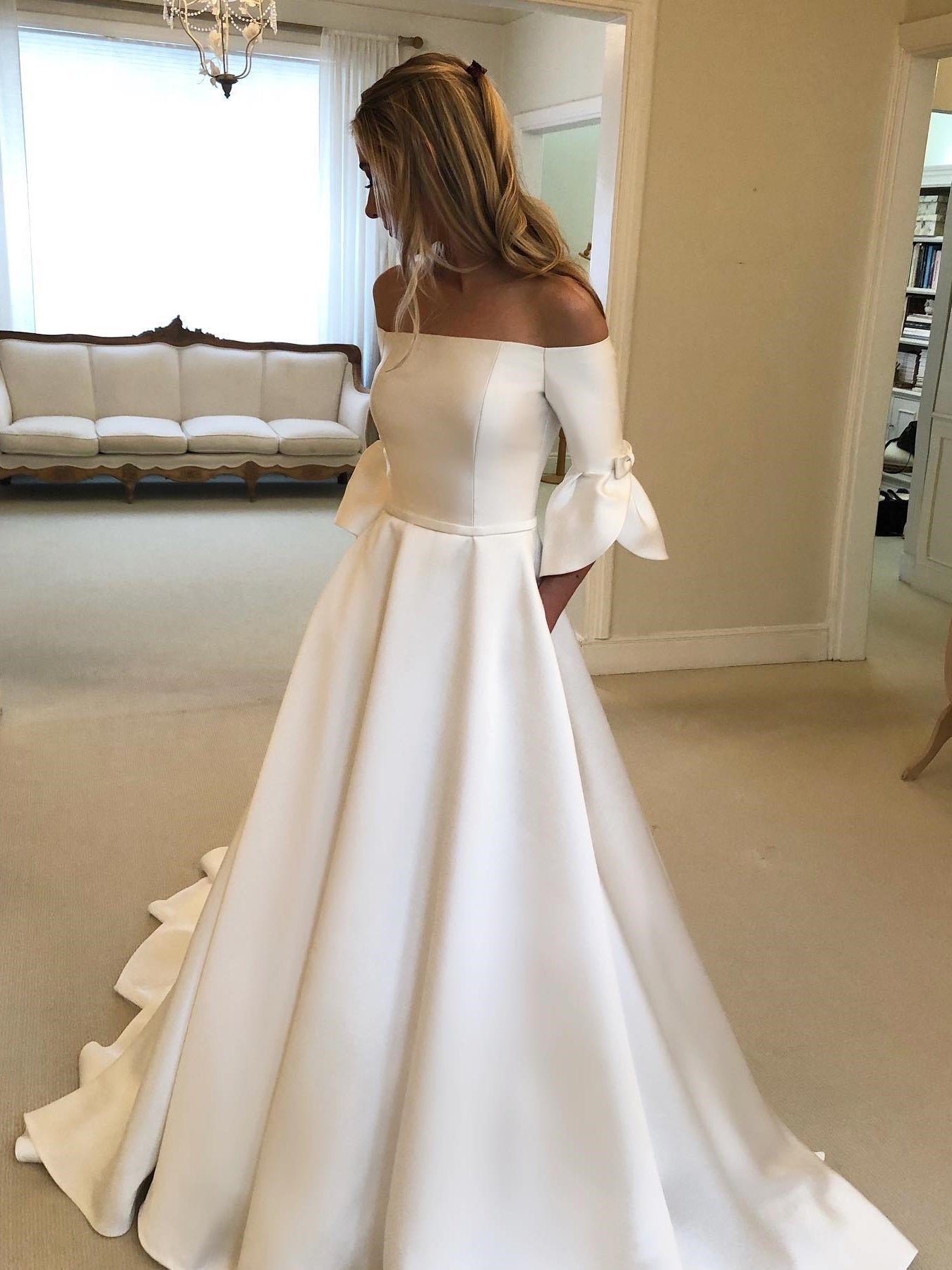 Off Shoulder Flared Cuff Sleeve Satin Bridal Ball Gown With Button Back - VelvetHem
