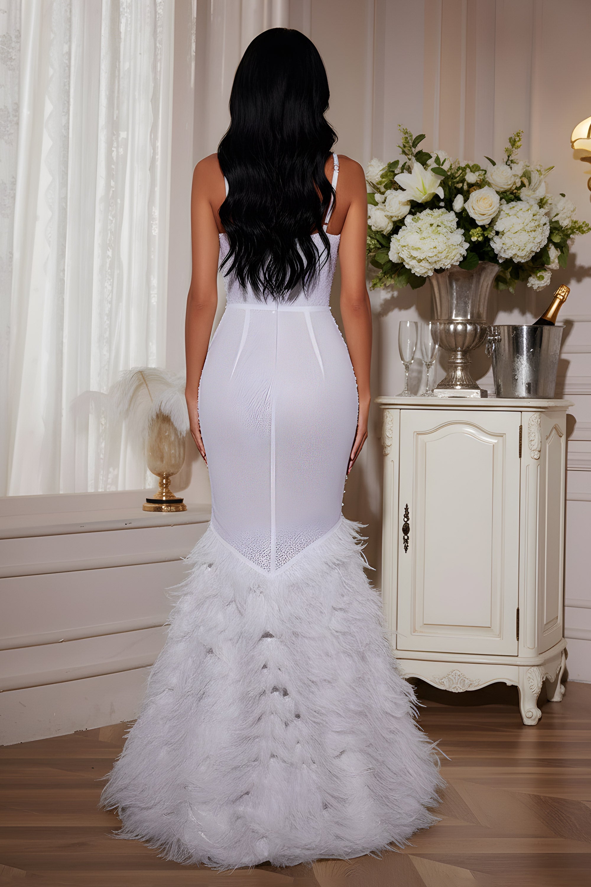 Elegant Beaded Mermaid Evening Gown with Feather Hem