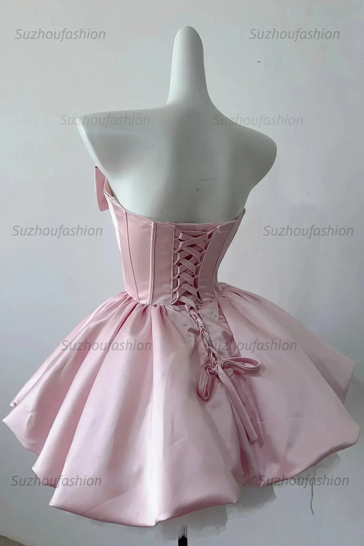 Pink Strapless Satin Corset Mini Homecoming Dress Oversized Front Bow & Ball Gown Skirt