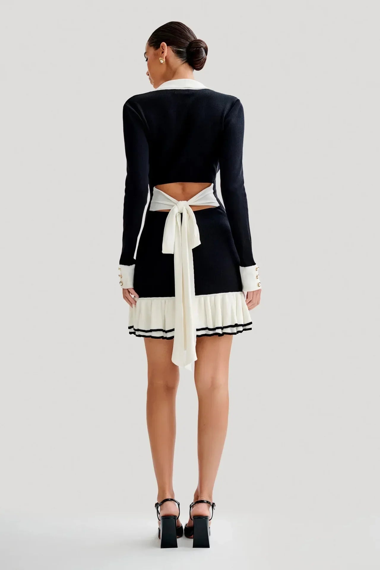 Ruffled Contrast Bow Open Back Lace - Up Knit Mini Dress