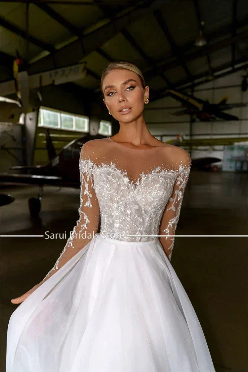 Sheer Neck with Heavy Crystals Long Sleeves White Wedding Dress Organza and Tulle A-line Bling Bridal Dress (ZD13563)