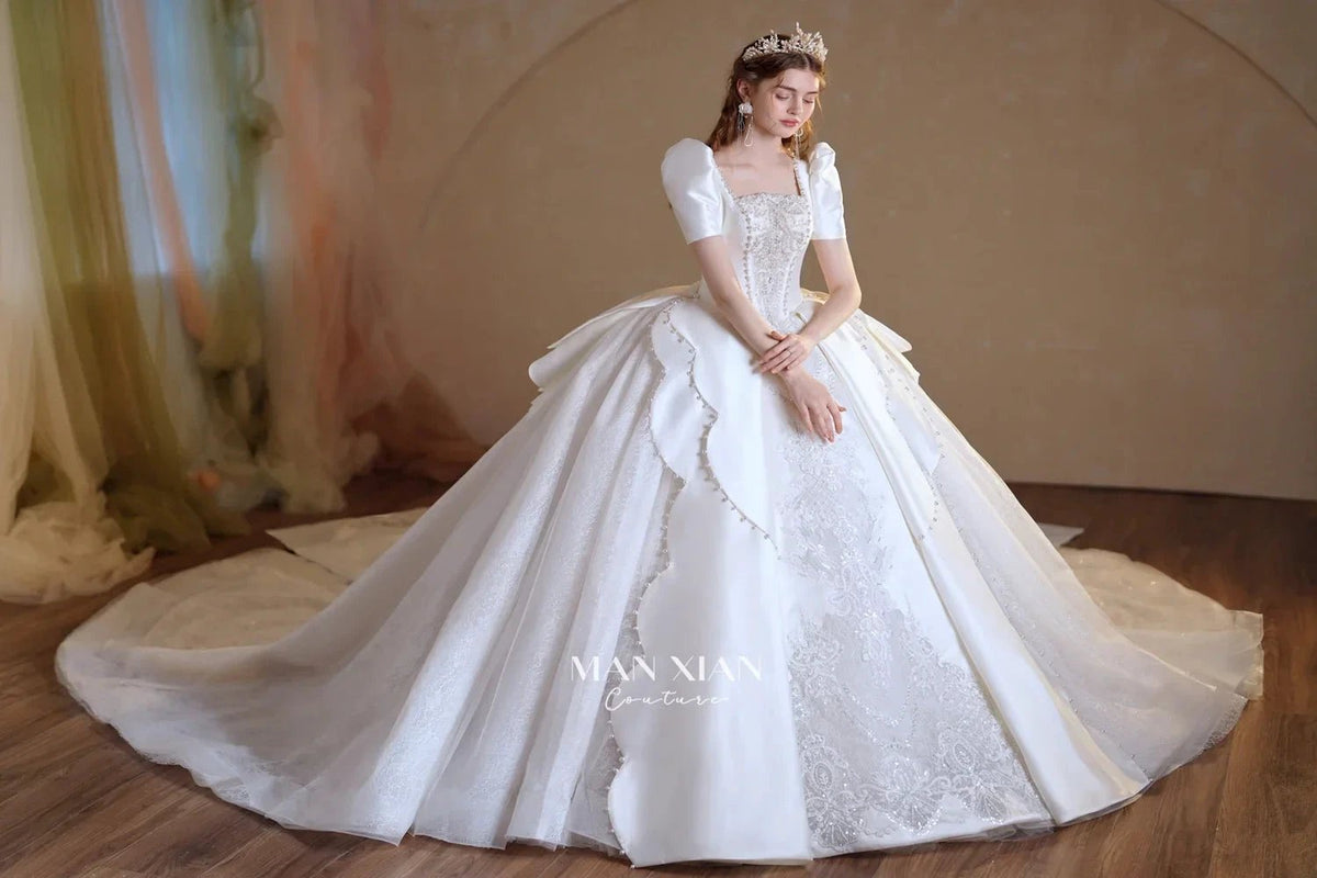 Regal Ivory Square-Neck Satin Ball Gown with Puff Sleeves, Pearl Embroidery & Oversized Bow Train m011 (ZD16938)