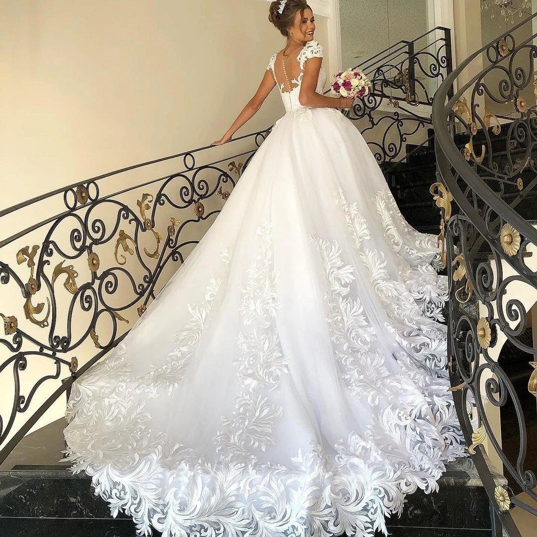 Elegant Long Princess Tulle Lace Wedding Dress with Cap Sleeves (ZD15025)