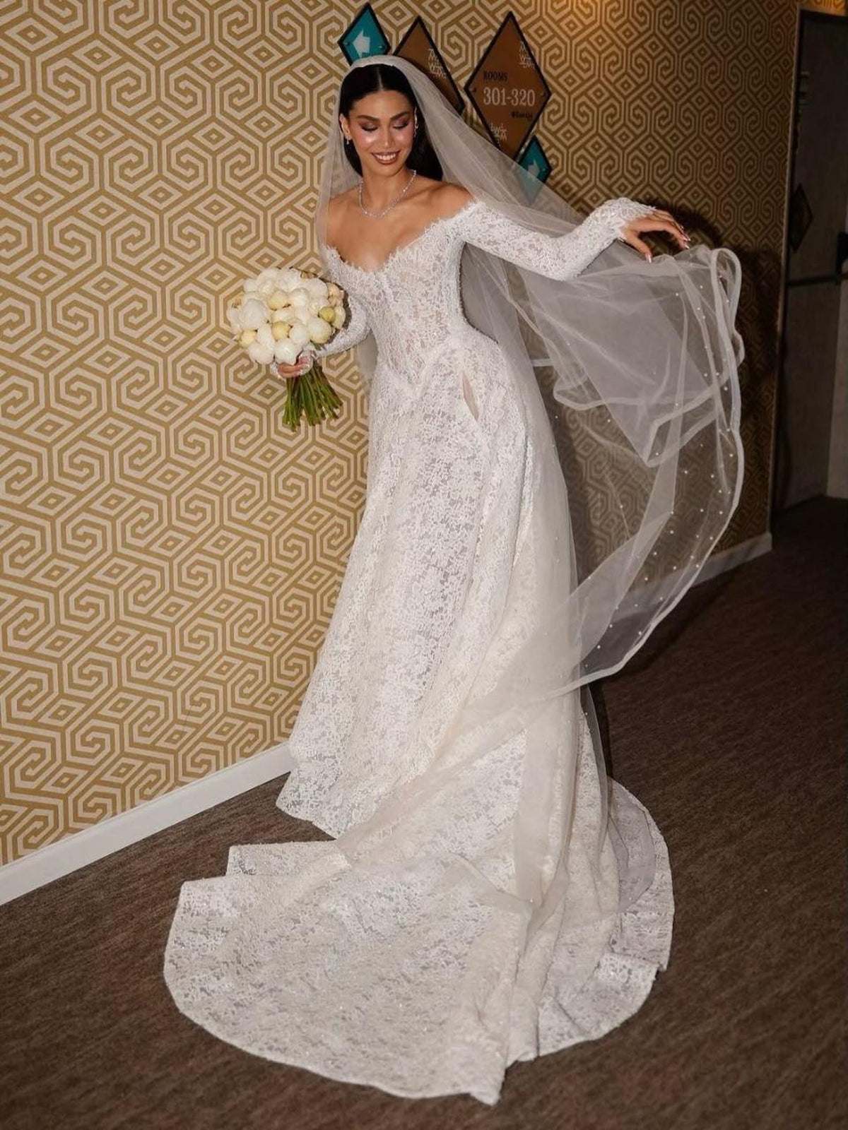 Elegant Off-the-Shoulder Long Sleeve Lace A-Line Wedding Dress - VelvetHem