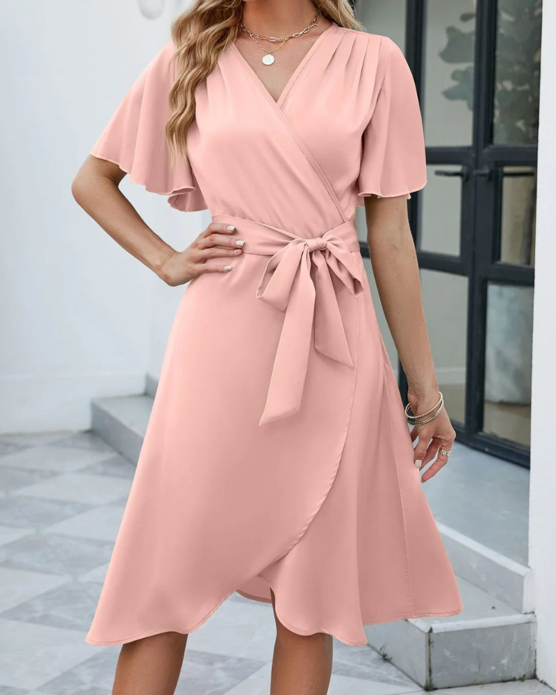 Felicity Statement Short Sleeved Flared Dress with a V Neckline and a Self Tie Belt Boutique Collection