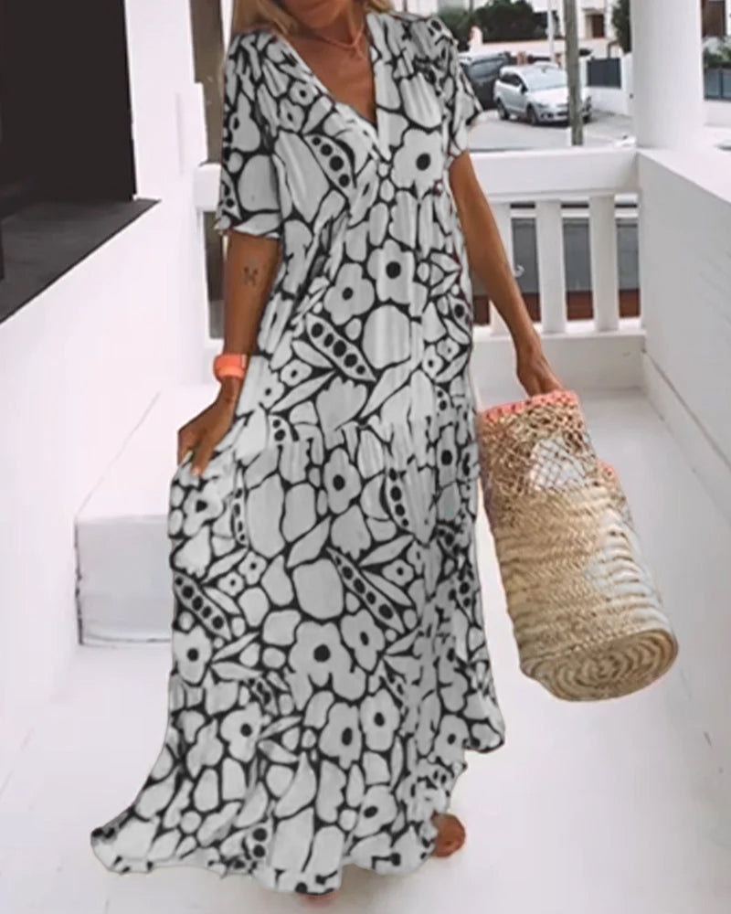 Yoselin Boutique Loose Fitting V Neck Dress with Print Chic Silhouette Collection