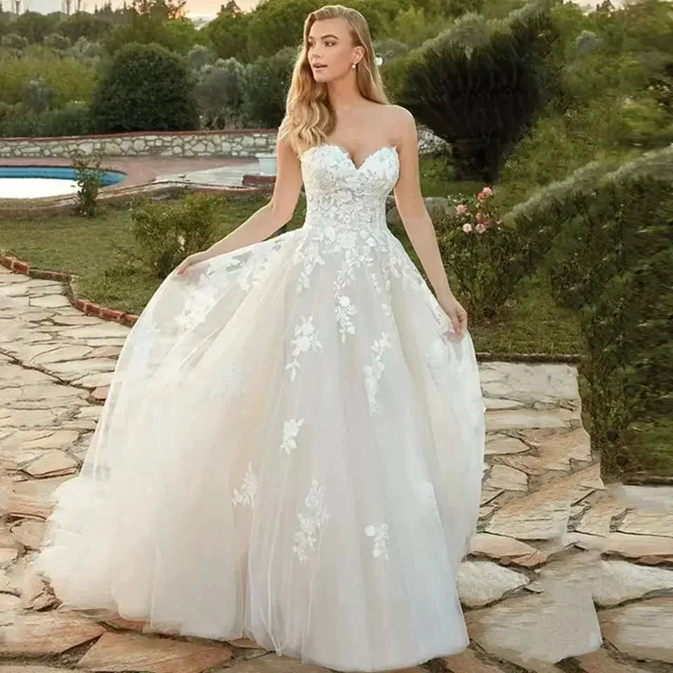 Beach Ivory Wedding Dresses for Women 2023 Summer Sweetheart A-Line Floor Length Illusion Bride Dress Bow Back Lace Applique (ZD14094) - VelvetHem