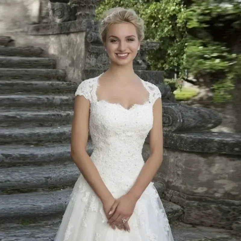 Cap Sleeve Wedding Dresses Amazing Neck Vestidos De Novia Appliques Vestido De Noiva Lace Robe De Mari�e (ZD14042) - VelvetHem