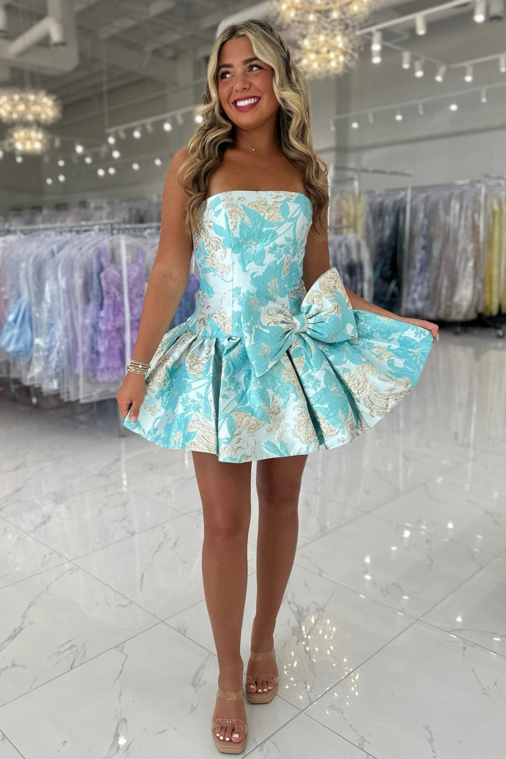 Chic Aqua Floral Strapless Homecoming Dress with Structured Bodice and Bow Accent