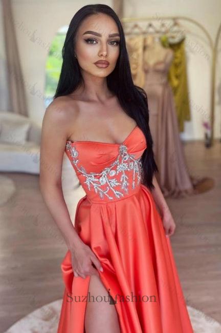 Coral Strapless Prom Dress A Line Beaded Sleeveless Panel Train Satin Formal Dress With High Slit