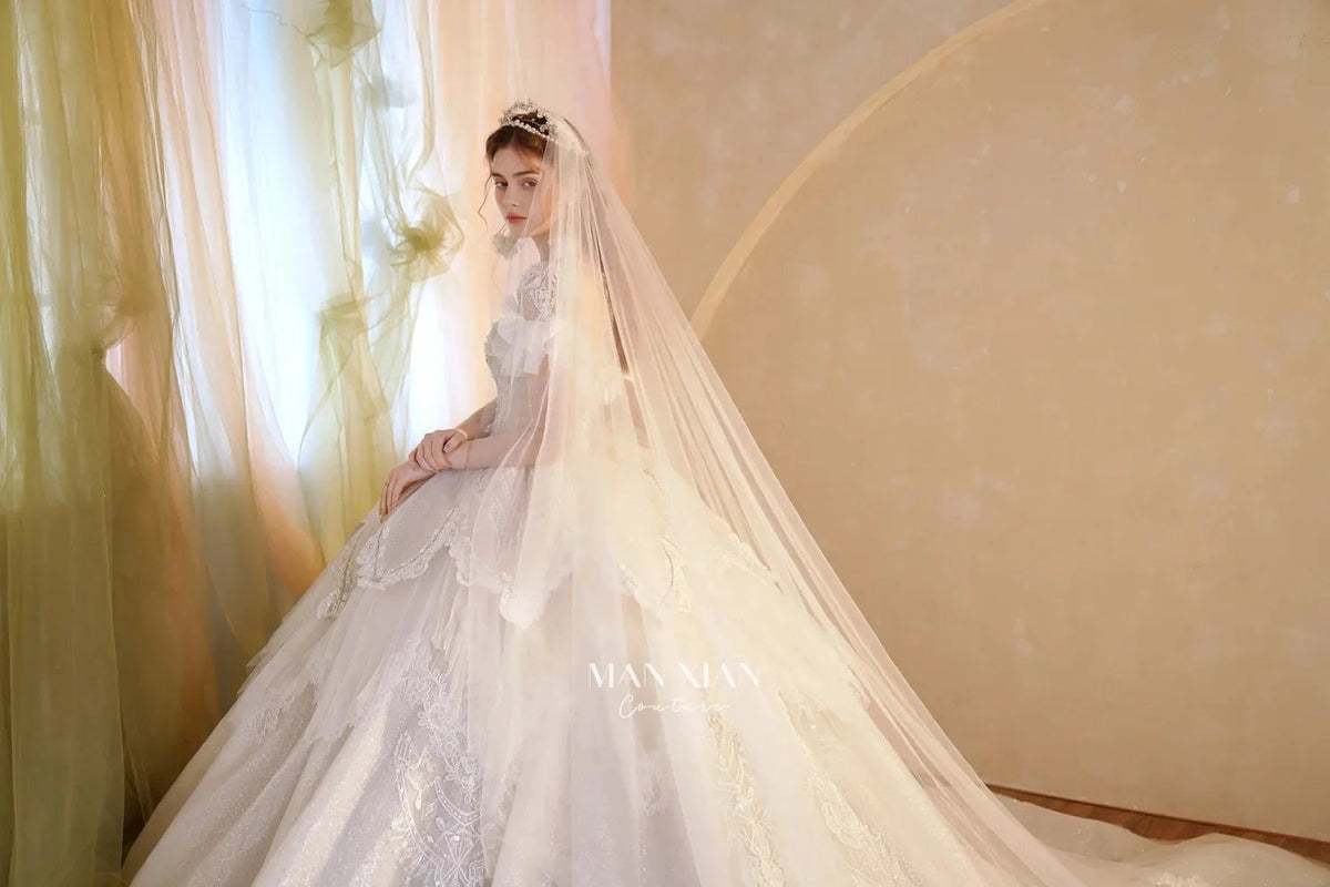 Luminous Ivory Sweetheart Glitter Tulle Ball Gown with Ruffled Sleeves, Pearl Embroidery & Lace Train (ZD16939)