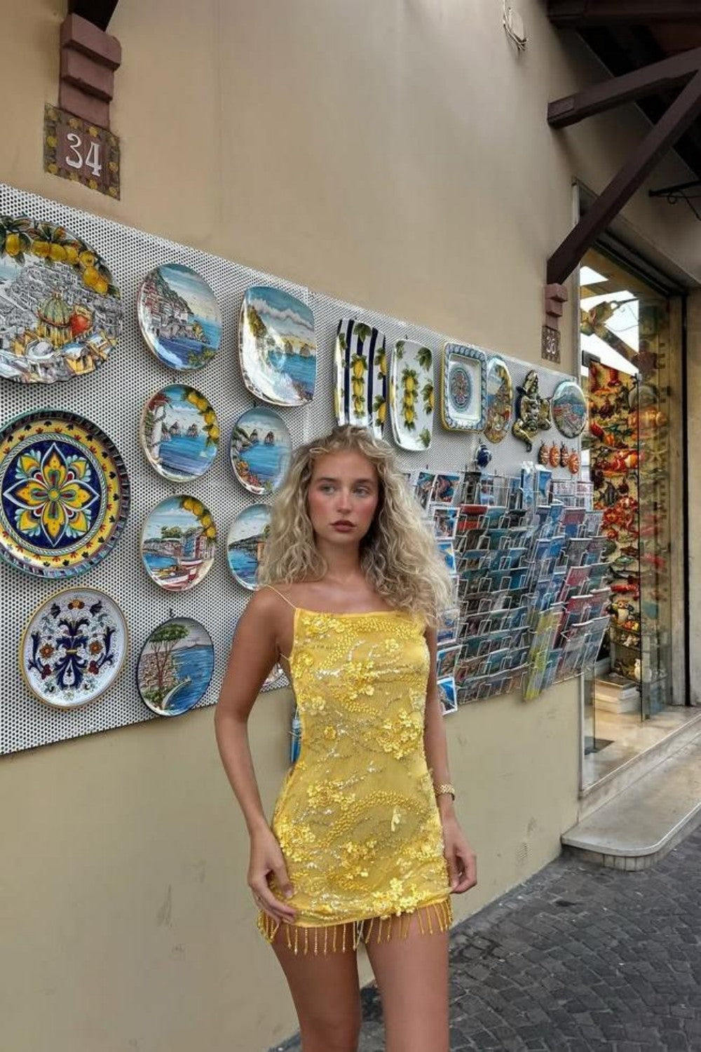 Glamorous Yellow Mini Homecoming Dress with Floral Beaded Embellishment and Fringe Trim Hem