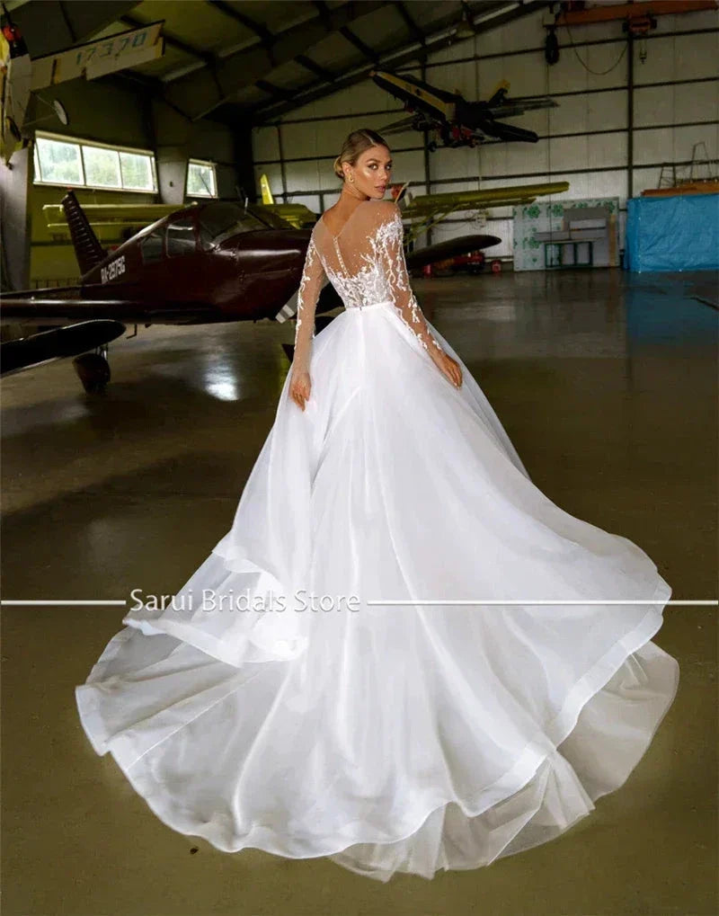 Sheer Neck with Heavy Crystals Long Sleeves White Wedding Dress Organza and Tulle A-line Bling Bridal Dress (ZD13563)