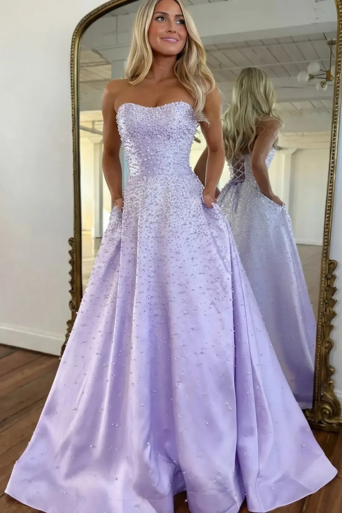 Luxurious A Line Sweetheart Black Long Prom Dress with Pearls Criss Cross Back