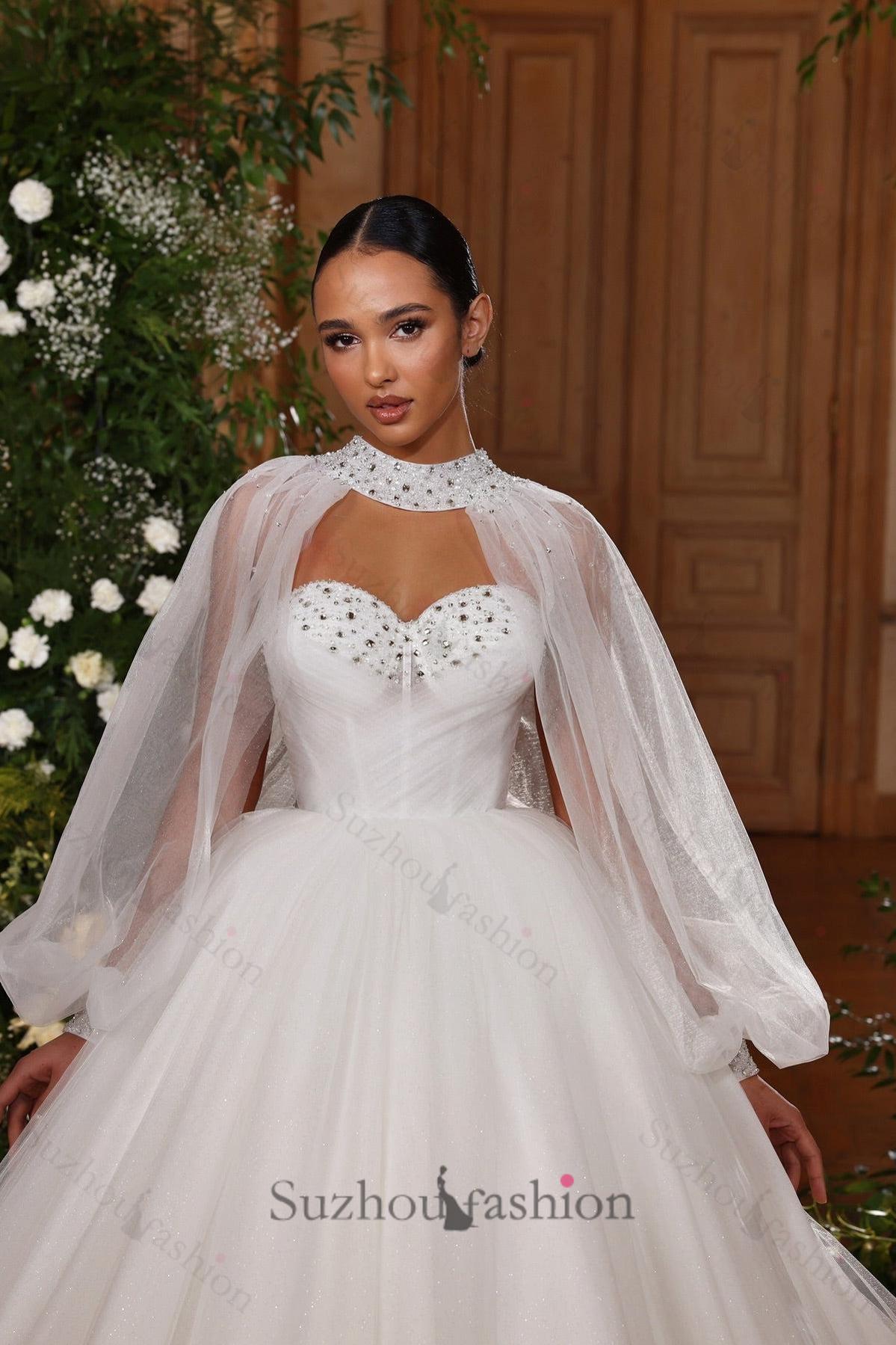White Wedding Dress Sweetheart Ball Gown Illusion Sleeveless Sweep Train Tulle Bridal Gown With Rhinestones