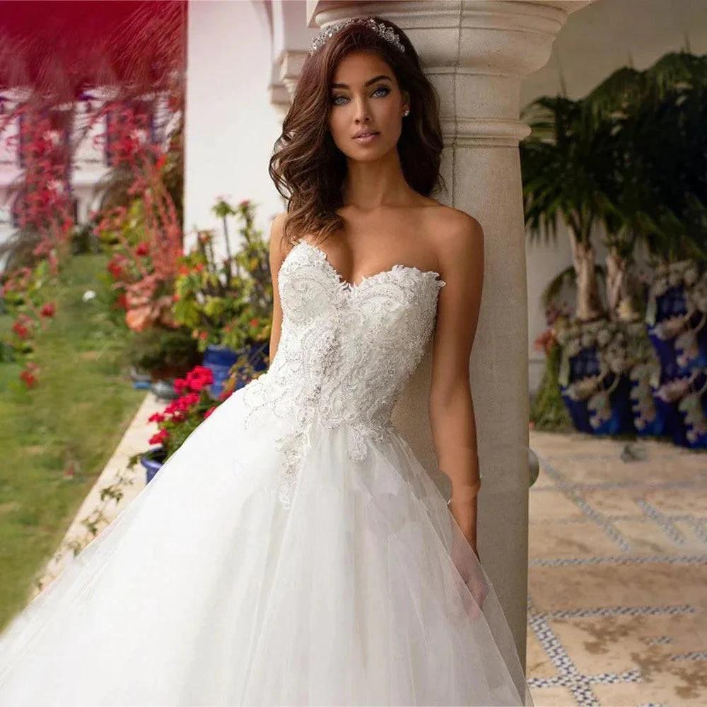 Backless Princess Sequined Beading Bodice Luxury Bridal Gown Sweetheart Lace Appliques Puffy Organza Wedding Dress Robe de Marie (ZD13367)