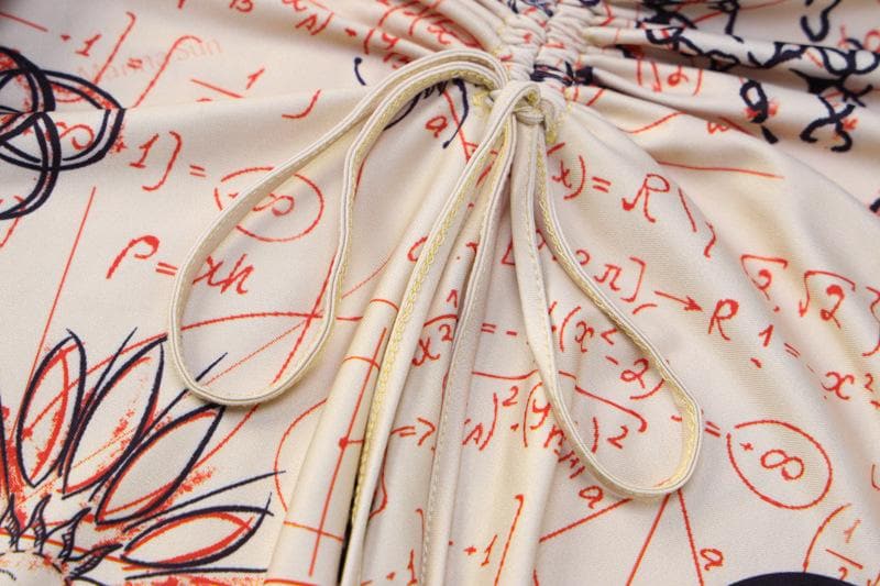 Long sleeve crewneck print drawstring ruched mini dress