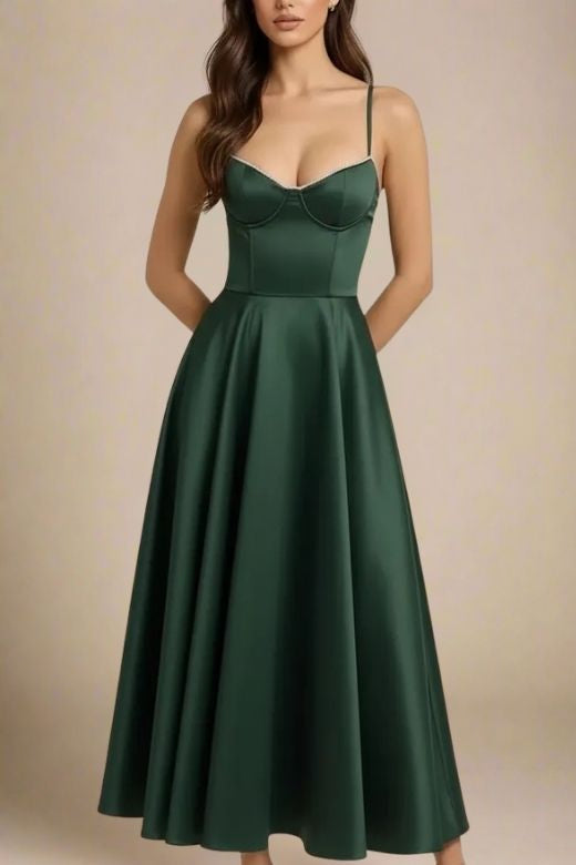 Woman wearing a figure flattering  Mavis Bodycon Midi Dress - Emerald Green BODYCON COLLECTION